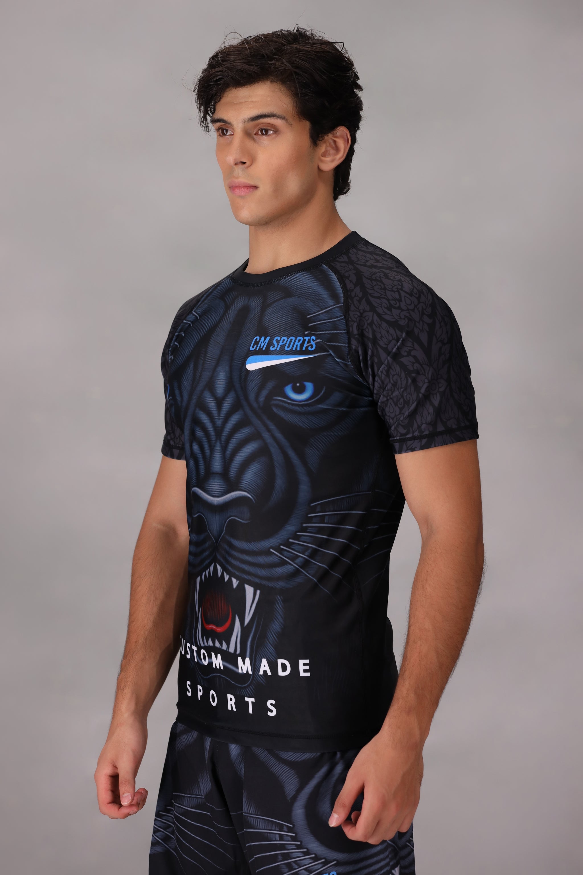 mma rashguards for men with a tiger design on a gray background